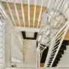 home-lift-elevator-and-white-stairs